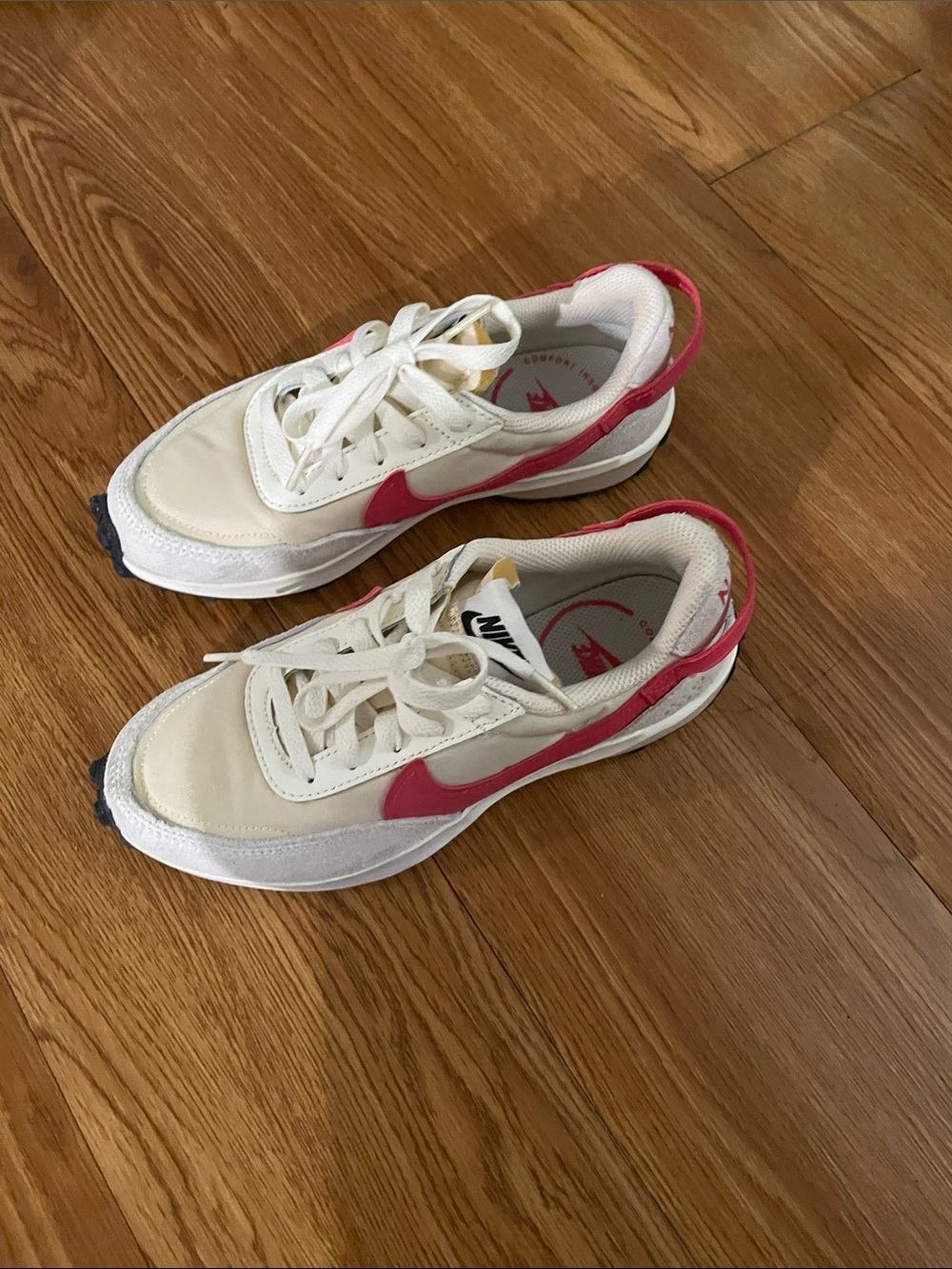 Nike Kids Cream Sneakers with Pink Swoosh Accent
